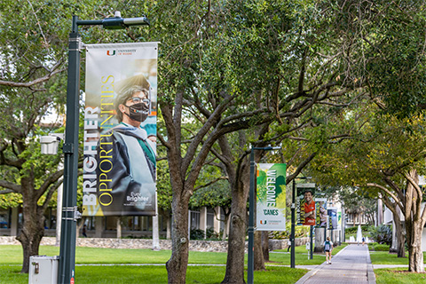 Banners on light posts around Coral Gables Campus