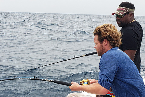  Nathan Garrison, left, and Warren Sapp testing Sharkbanz off the Florida coast. 