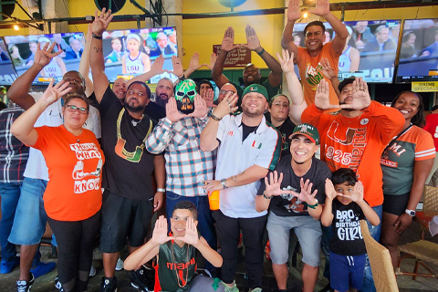   The Broward 'Canes Community alumni group hosted a watch party on March 26 at the Carolina Ale House in Weston, Florida, for the Elite Eight matchup. Photo: Desiree Rodriguez/University of Miami.