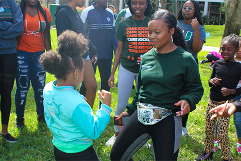 University of Miami students celebrated a fun day with grade-schoolers with Streamline Miami, working on  projects and other activities. 