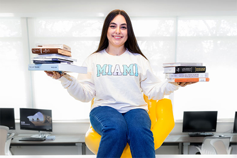  After coming into the University with more than 50 credits from her high school dual enrollment program, senior Katerina Fernandez will graduate with a combined five majors in the arts and humanities. Photo: Joshua Prezant/University of Miami 