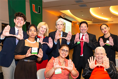  University of Miami President Julio Frenk, top center, is surrounded by students and donors during the Scholarship Donor Celebration at the Shalala Student Center Ballroom on Feb. 14. Photo: Jenny Abreu for the University of Miami 